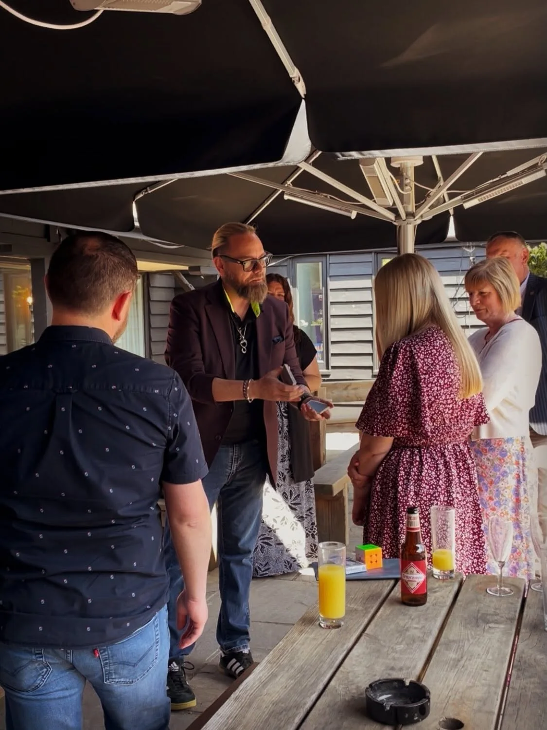 Shane Joseph performing close-up magic for guests
